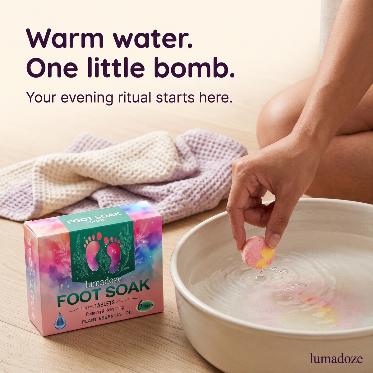 Adding a Lumadoze foot-soak tablet to warm water